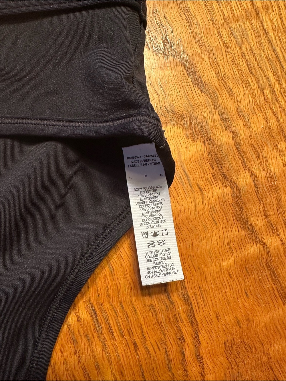 Nike Black Racerback Sports Bra with White Swoosh - Picture 3 of 3